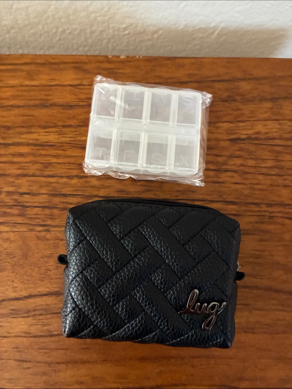 Lug black quilted pill box